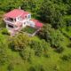 DJI Mavic Pro quadcopter drone camera shoot of a farmhouse in the hills
